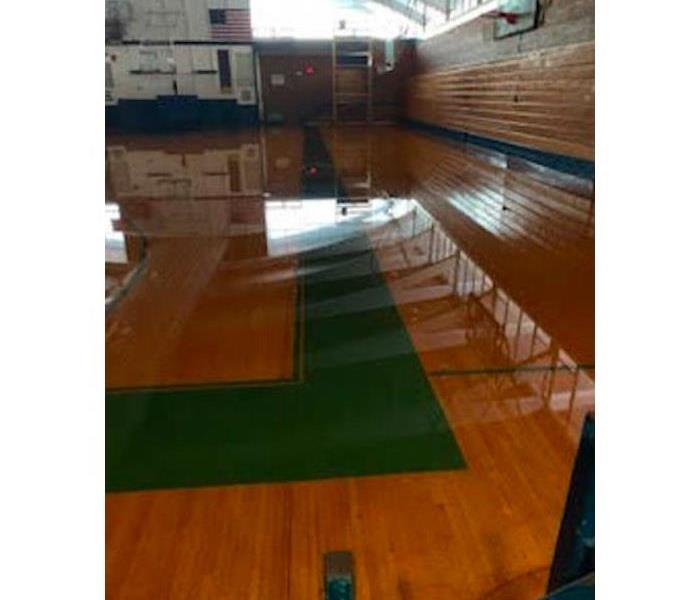 Standing water in a gym.