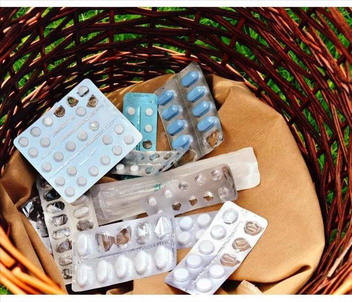 Packages of medicine inside a basket. Concept of medicine thrown inside garbage basket 