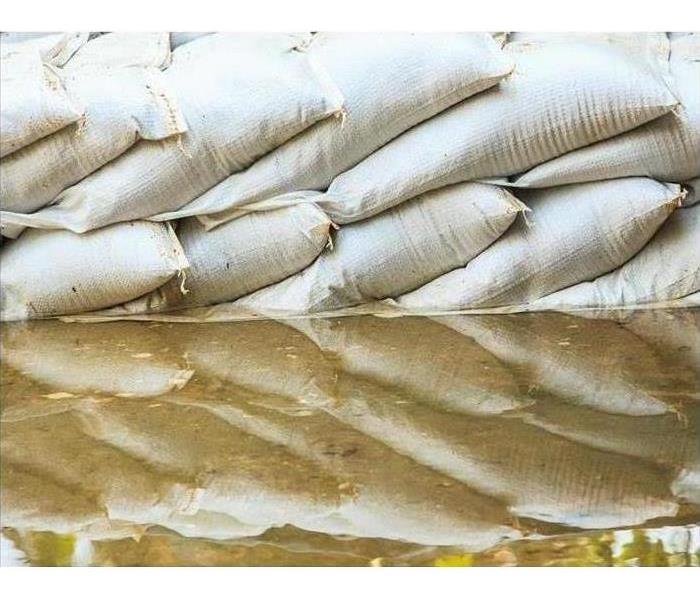 white sandbags for flood defense